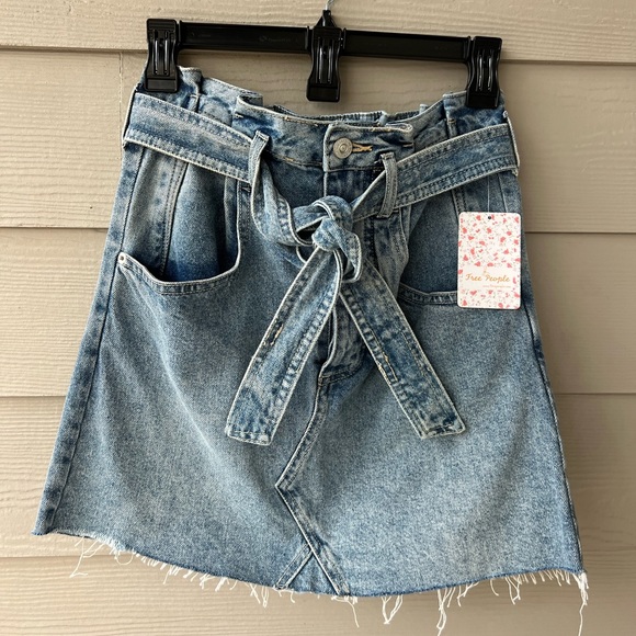 New with tags. Free People East of Eden Belted Denim Frayed Mini Skirt - Picture 2 of 4